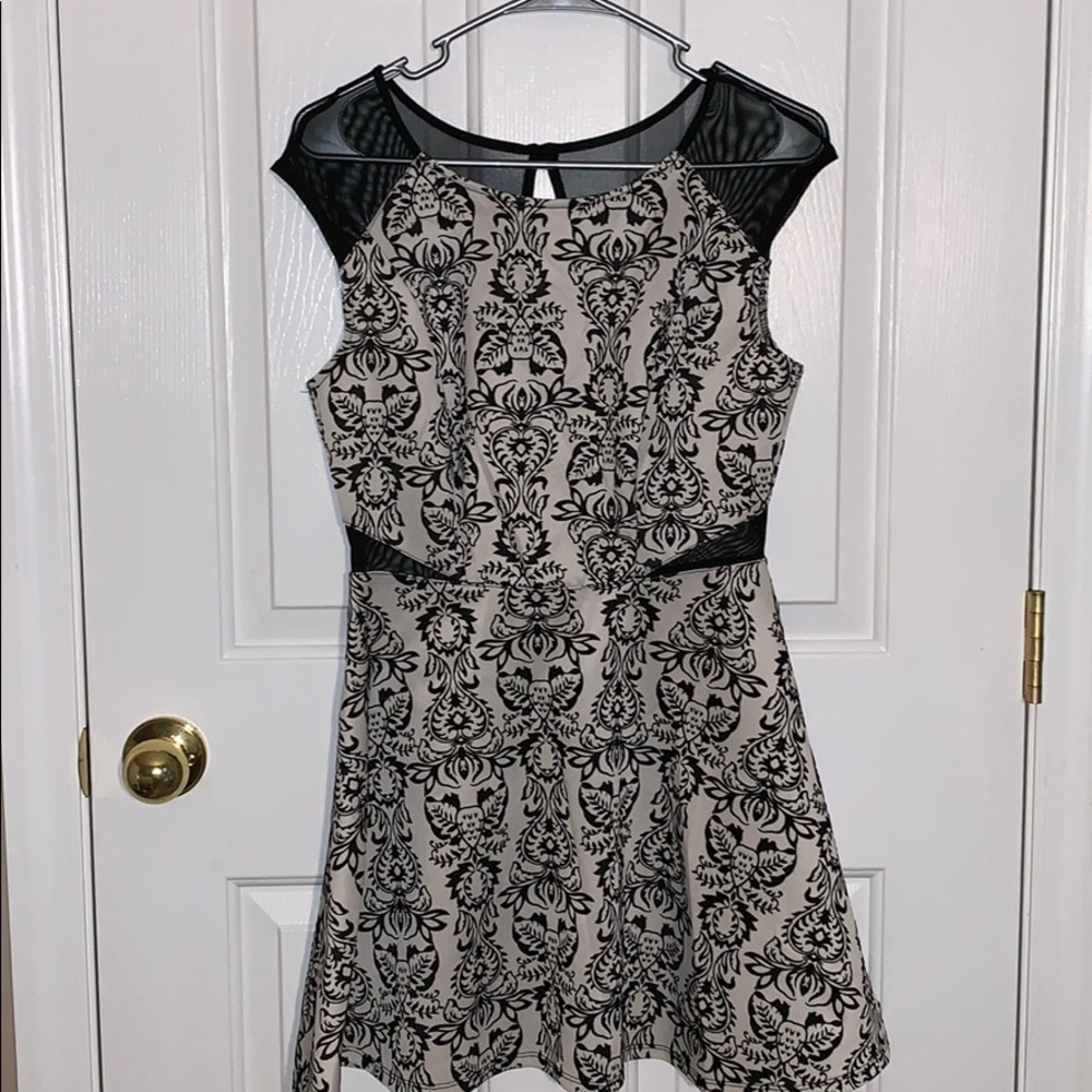 Black and white dress with mesh sleeves